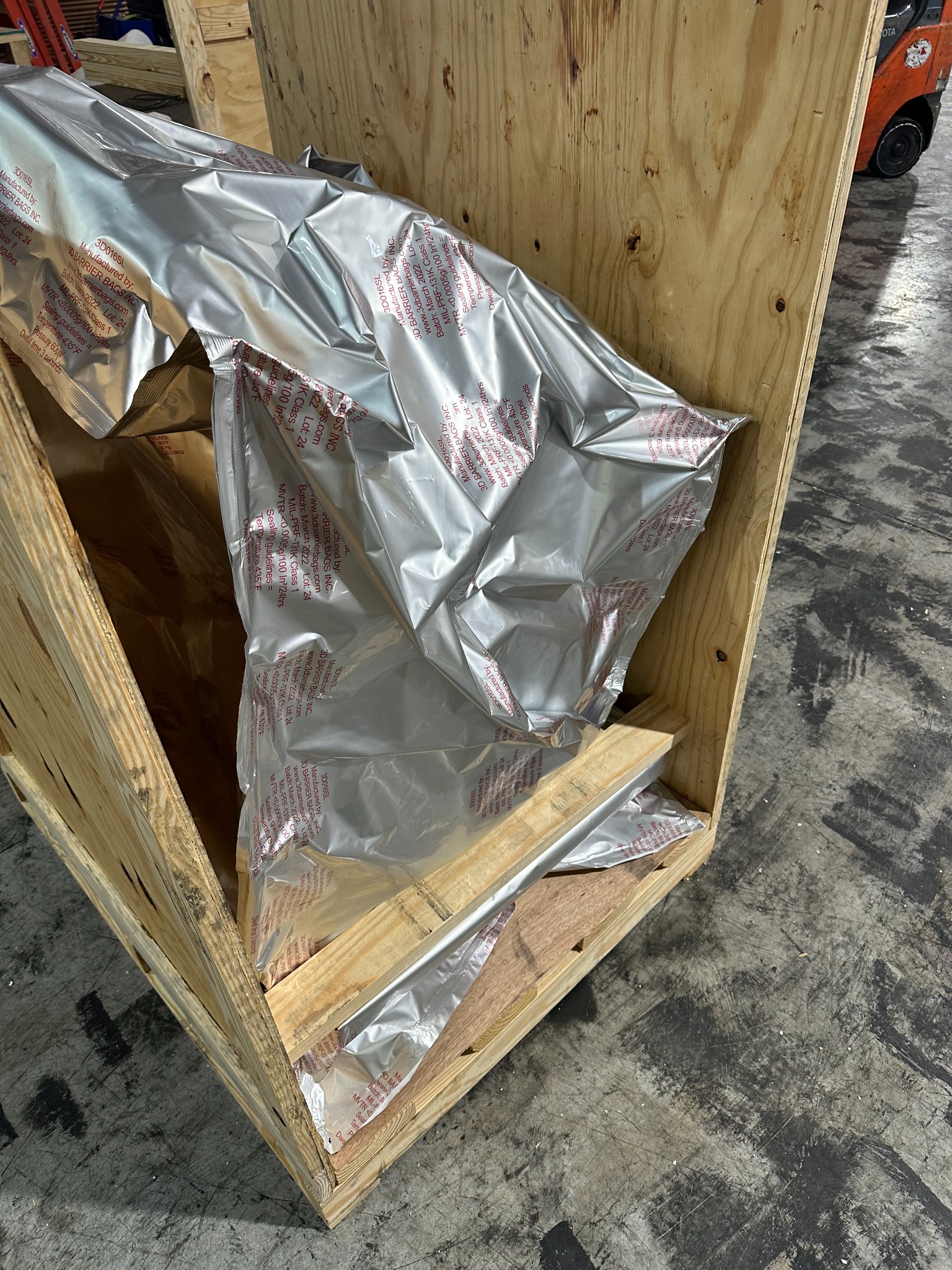 Vacuum-packed equipment protected inside a wooden crate